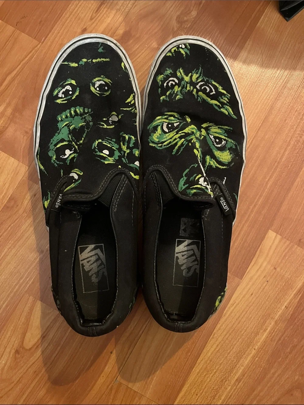 Vans Black Slip-On Sneakers with Eyes in the Dark Size M 10.5 W 12